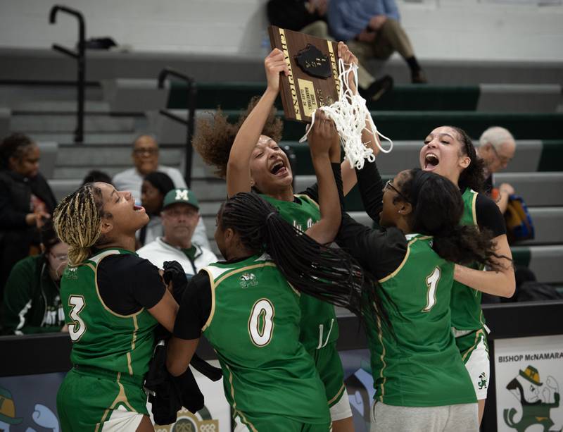 Bishop McNamara hoists the Regional Title after defeating Joliet Catholic in the Class 2A Regional Championship on Thursday, Feb. 19, 2026.