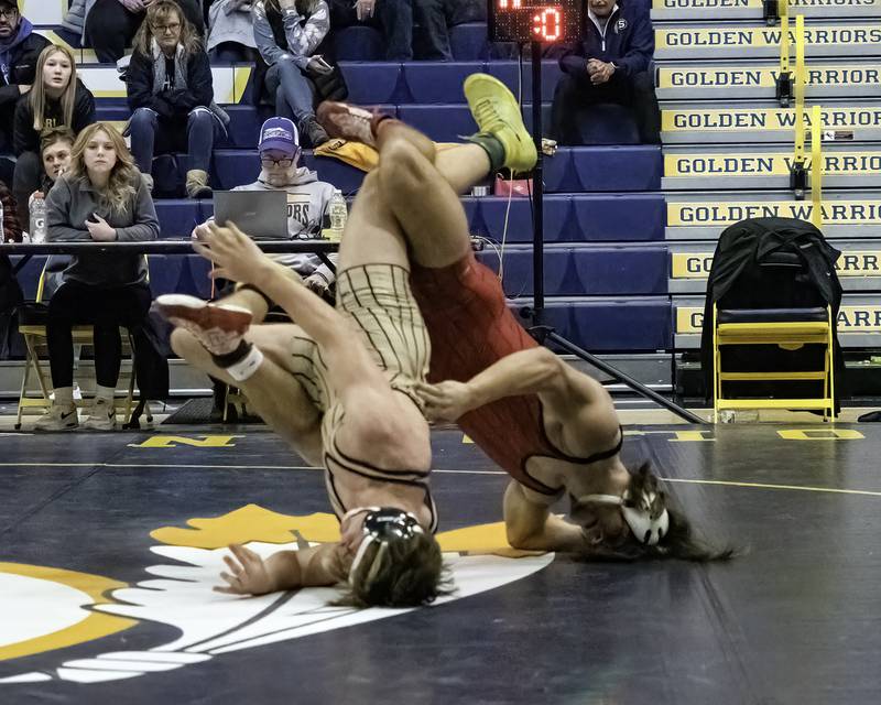 Sterling's Tommy Tate (left) and Erie-Prophetstown's Jase Grunder go upside-down during their 160-pound title bout at the 44th annual Carson DeJarnatt Tournament on Saturday, Dec. 3, 2022 at Musgrove Fieldhouse in Sterling.