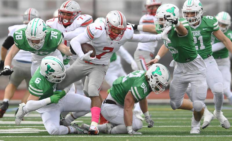 Palatine’s Dominick Ball is surrounded by York defense in a Class 8A quarterfinal playoff football game in Elmhurst on Saturday, November 12, 2022.