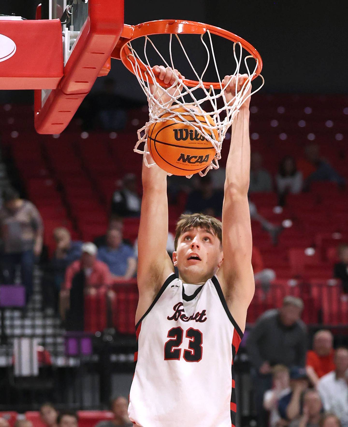 Benet’s Edvardas Stasys slams home two points against Auburn Monday, March 9, 2026, during their IHSA Class 4A supersectional matchup in the Convocation Center at Northern Illinois University in DeKalb.