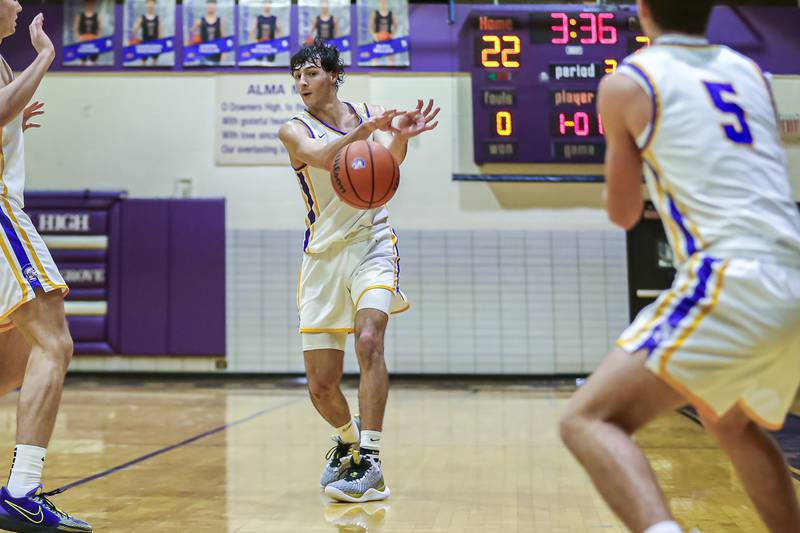 Downers Grove North's Aidan Akkawi (24) whips a pass to Owen Thulin (5) during basketball game between Downers Grove South at Downers Grove North. Dec 16, 2023.