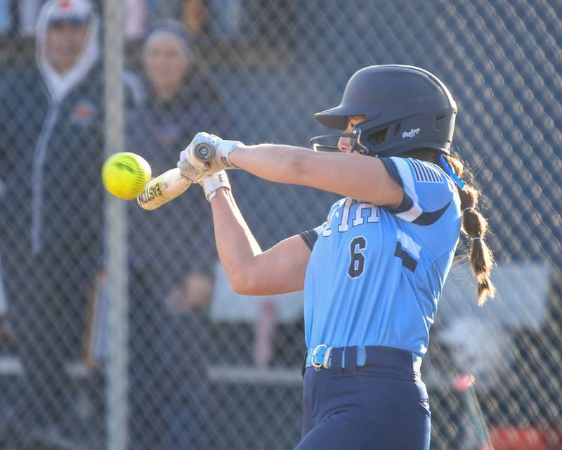 Downers Grove South's Jenna Portell (6) makes contact with the ball for a base hit on Thursday April 3, 2025, while taking on Oswego High School held at Downers Grove South.