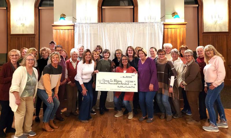 The Rock River Garden Club donated $12,500 to Dixon in Bloom’s summer petunia project which involves about 170 volunteer hours to grow, plant and maintain over 300 hanging petunia baskets which are displayed in Dixon from May until late August.