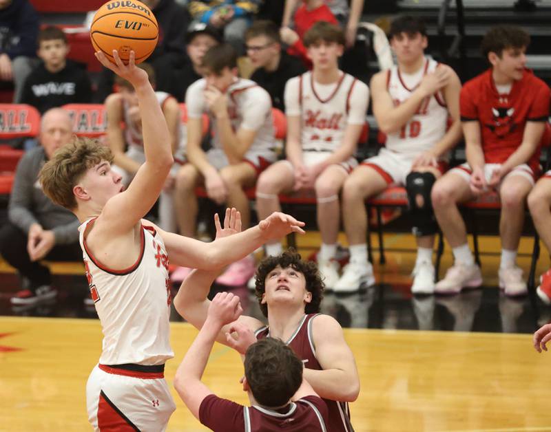 Hall's Chace Sterling lets go of a shot against Rockridge during the Class 2A Regional quarterfinal game on Monday, Feb. 23, 2026 at Hall High School.