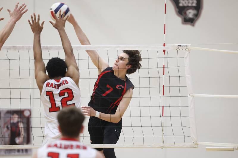 Lincoln-Way Central’s Dylan Brannigan hits a shot down the line against Bolingbrook on Tuesday May 7, 2024 in New Lenox.