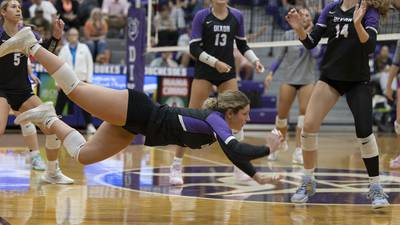 Playing as one helps Dixon beat Rochelle