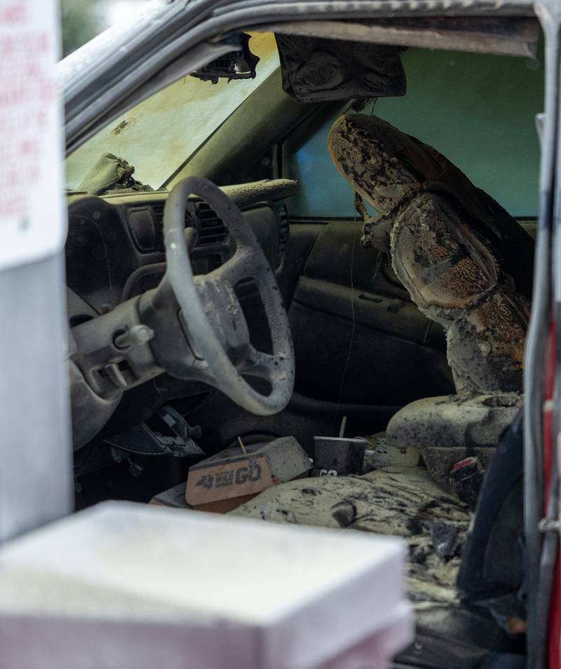 Charred remains of vehicle interior sit at scene of internal electrical fire of vehicle near gas pump on Tuesday, December 30, 2025 at Casey's on 1100 Shooting Park Road in Peru. The fire was extinguished by 15 year old driver Jesus Gonzalez of Streator.