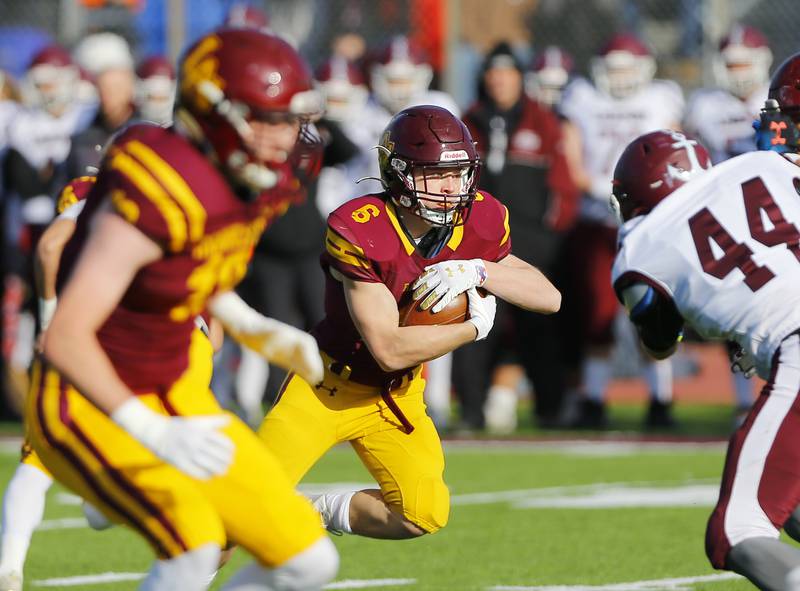 Loyola's Will Nimesheim runs the ball during the IHSA Class 8A varsity football semifinal playoff game between Lockport Township and Loyola Academy on Saturday, November 20, 2021 in Wilmette.