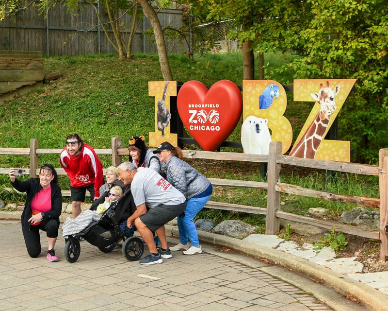 The Testolin family from Darin, Woodridge and Florida pose for a photo before participating in the Zoo Run 5k on Sunday Sept. 8, 2024, held at Brookfield Zoo in Brookfield.