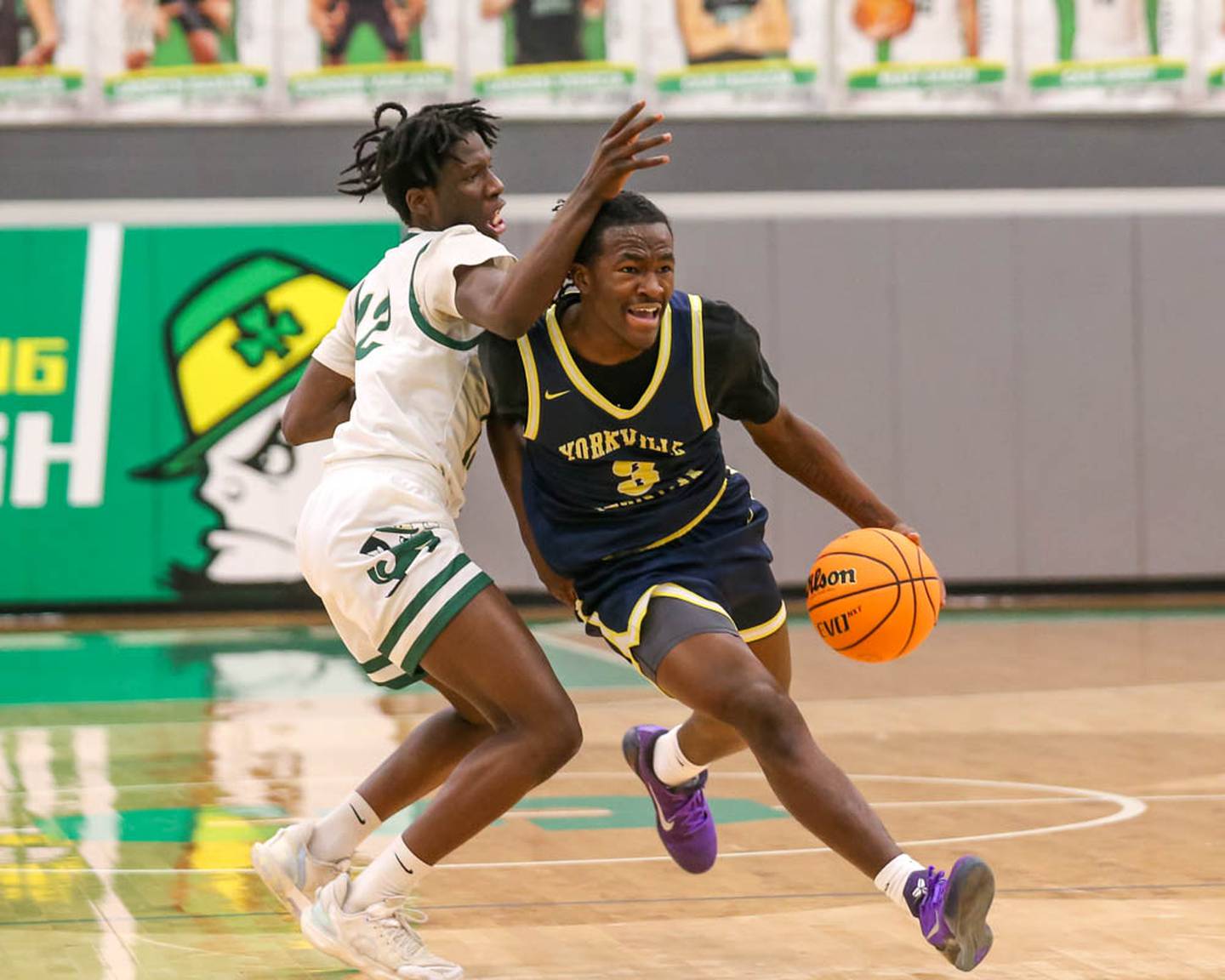 Yorkville Christian's Jayden Riley (3) drives drives against Bishop McNamara's Corey Hathaway during the Fightin' Irish's 69-56 in overtime victory against Yorkville Christian in the IHSA Class 2A Seneca Sectional championship on Friday, March 6, 2026.
