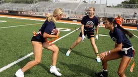 Girls flag football debuts as IHSA sport this fall. Local players got tips at Chicago Bears clinic
