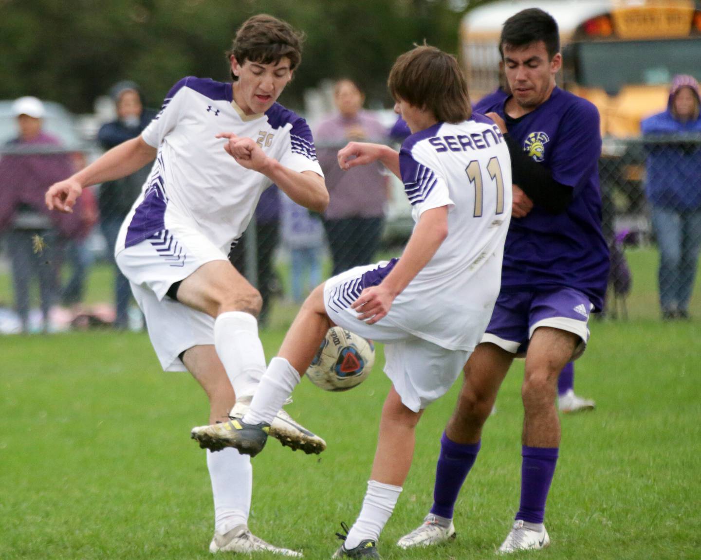 Serena's Richie Armour (20) and Mason McNelis (11) keep the ball away from Mendota's Ricky Orozco (16) during the Class 1A regional final game in Serena on Friday, Oct. 15, 2021.