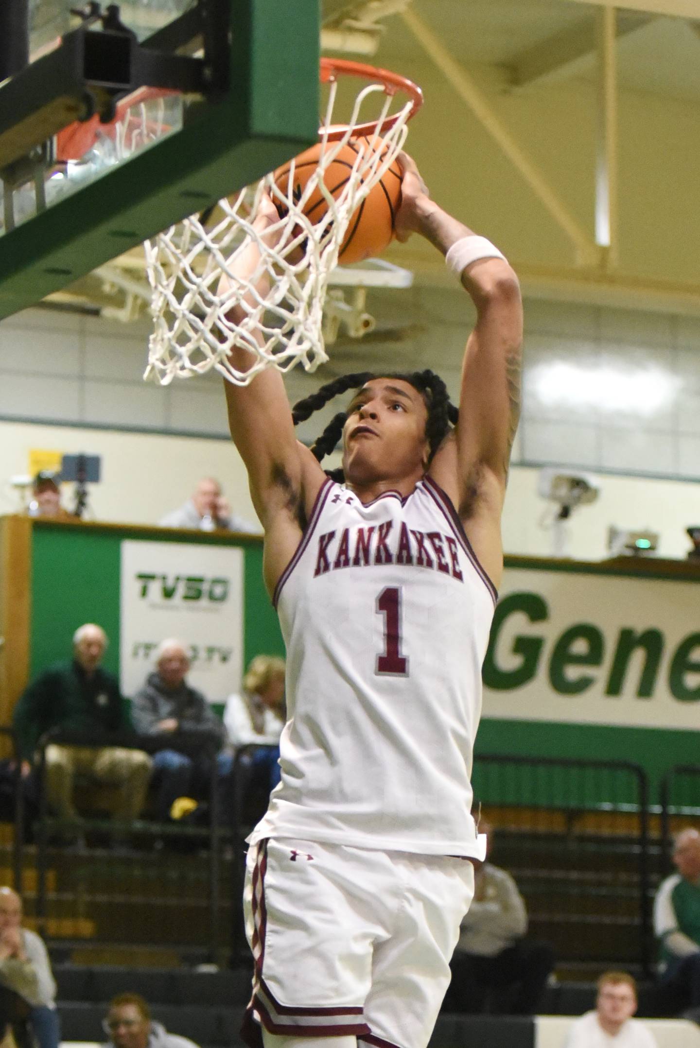 Kankakee's Lincoln Williams elevates for a dunk during the Kays' IHSA Class 3A Geneseo Regional semifinal against Morris Wednesday, Feb. 25, 2026.