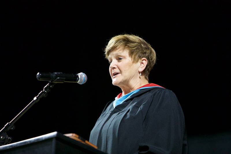 Jacobs High School Principal Barb Valle congratulates the graduates during the Algonquin's school graduation ceremony on May 21, 2022, at the NOW Arena in Hoffman Estates.