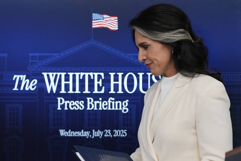 Director of National Intelligence Tulsi Gabbard departs after speaking with reporters in the James Brady Press Briefing Room at the White House, Wednesday, July 23, 2025, in Washington. (AP Photo/Julia Demaree Nikhinson)
