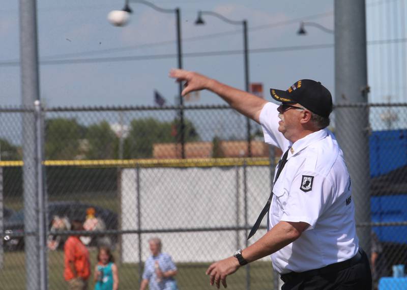 Chuck Mammen, member of the Peru Veterans Memorial Group throws out the ceremonial first pitch before the Illinois Valley Pistol Shrimp game honoring Veterans on Thursday, July 3, 2025 at Schweickert Stadium in Peru.