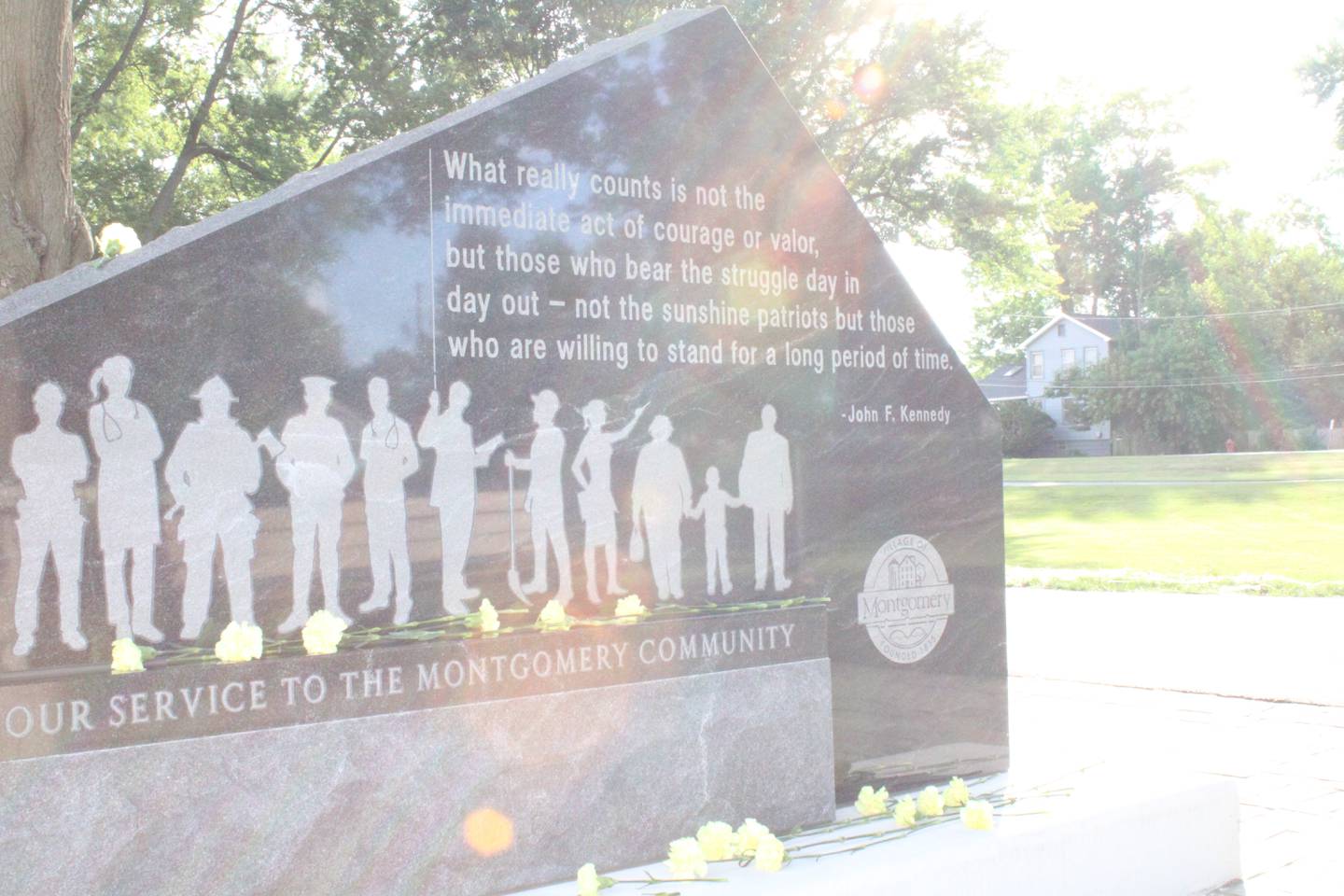 The newly unveiled monument to first responders and essential workers bearing a quote from President John F. Kennedy in Montgomery
