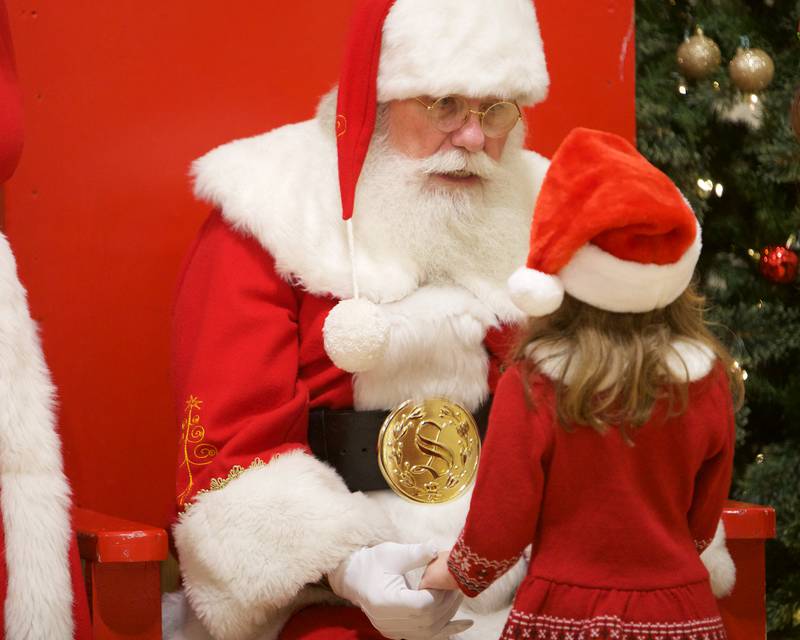 Audrey Magiera, 5, of Batavia visits with Santa during breakfast with Santa at Batavia Park District on Saturday, Dec. 9, 2023 in Batavia.