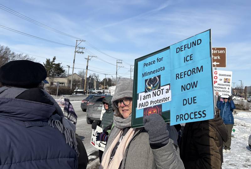 Jana Parejko holds a sign against ICE at a protest in McHenry Feb. 1, 2026.