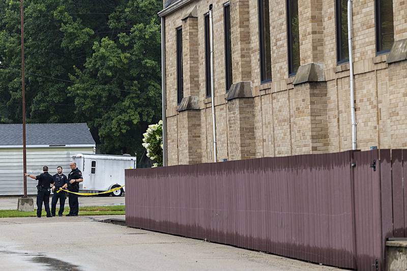 Officers rope off an area of East Fifth Street in Sterling on Tuesday, July 23, 2024 after a shooting.