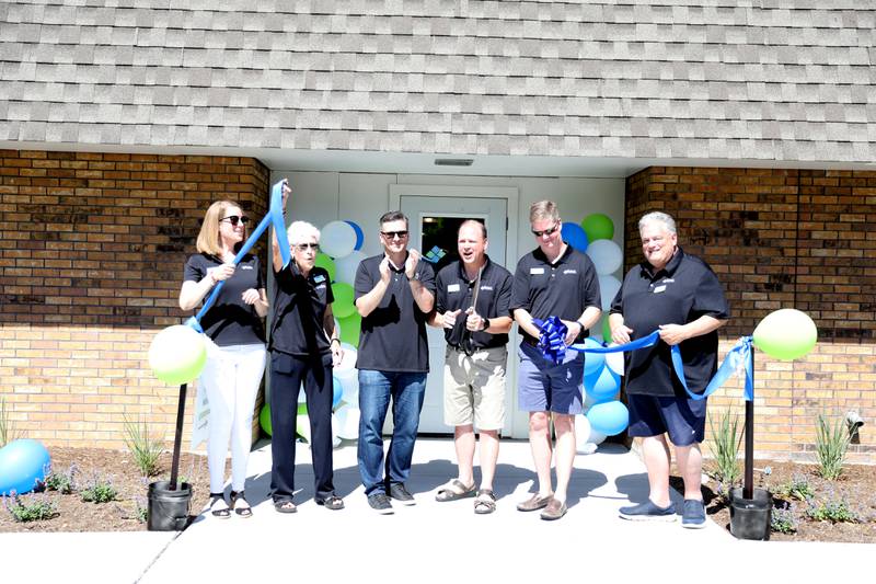 Elmhurst Park District board members cut the ribbon to open the new Centennial Recreation Center in Elmhurst on Friday, June 17, 2022. The facility, a former church, will house adult programming.