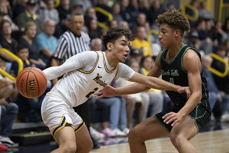 Sterling’s JP Schilling works against Rock Falls’ Devin Tanton on Tuesday, Nov. 29, 2022.