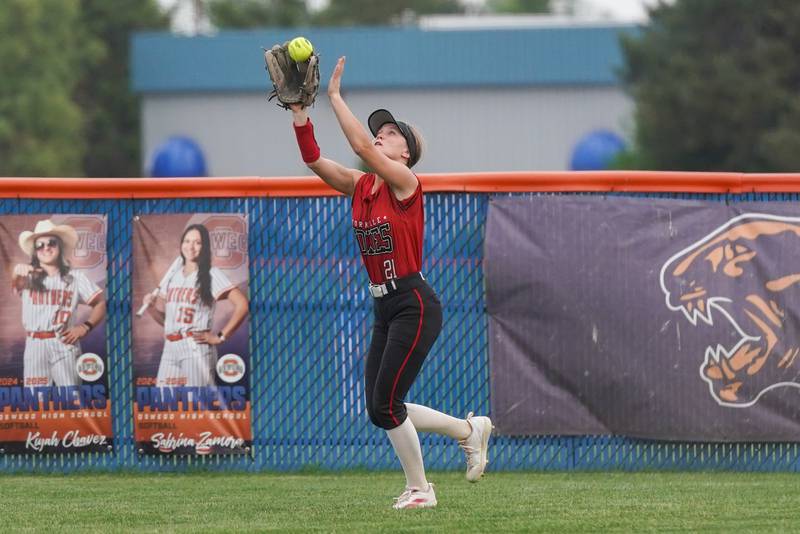 Yorkville's Isla Eidsness (21) catches a fly ball for an out against Oswego during a softball game at Oswego High School on Thursday, May 15, 2025.