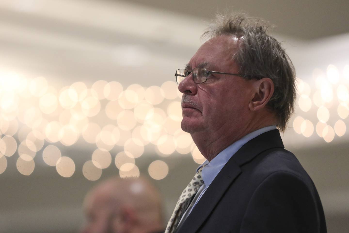 Bob Wunderlich watches as result come in on Tuesday, April 6, 2021, at Local 176 Hall in Joliet, Ill.