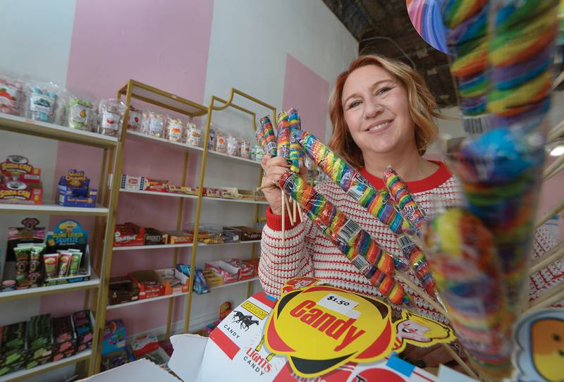 Hey Sweetie owner Stephanie Cato shows one of the many candy selections at her downtown Ottawa shop.