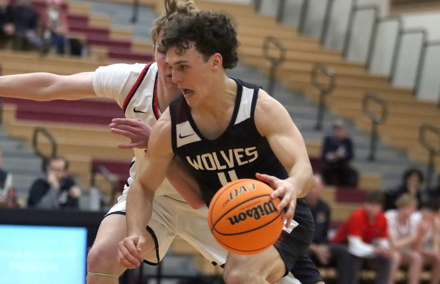 Prairie Ridge’s Luke Vanderwiel drives with the ball in varsity boys basketball on Tuesday, Feb. 18, 2025, at  Huntley High School in Huntley.