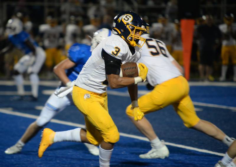 Sterling's Antonio Tablante  make this way toward the end zone during their game against St. Francis Friday Sept 2, 2022.