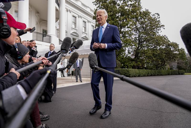 FILE - President Joe Biden speaks to members of the media before boarding Marine One on the South Lawn of the White House in Washington, Jan. 30, 2024. U.S. adults are only feeling slightly better about the economy, despite stocks being near record highs and surprisingly strong growth last year. A new poll from The Associated Press-NORC Center for Public Affairs Research finds that 35% of U.S. adults call the national economy good. (AP Photo/Andrew Harnik, File)
