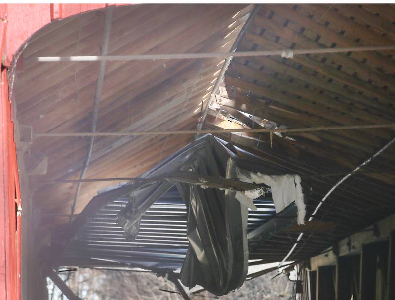 A view of the damage looking inside  the Red Covered Bridge on Thursday, Nov. 16, 2023 in Princeton. Illinois Department of Transportation, Illinois State Police and Bureau County law enforcement surveyed the damage bridge after it was struck by a semi-truck.