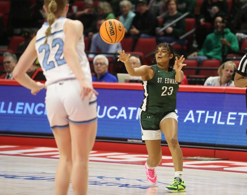 St. Edward's Ginger Younger passes the ball by Cissna Park's Josie Neukomm during the Class 1A third place game on Friday, March 7, 2025 at CEFCU Arena in Normal.