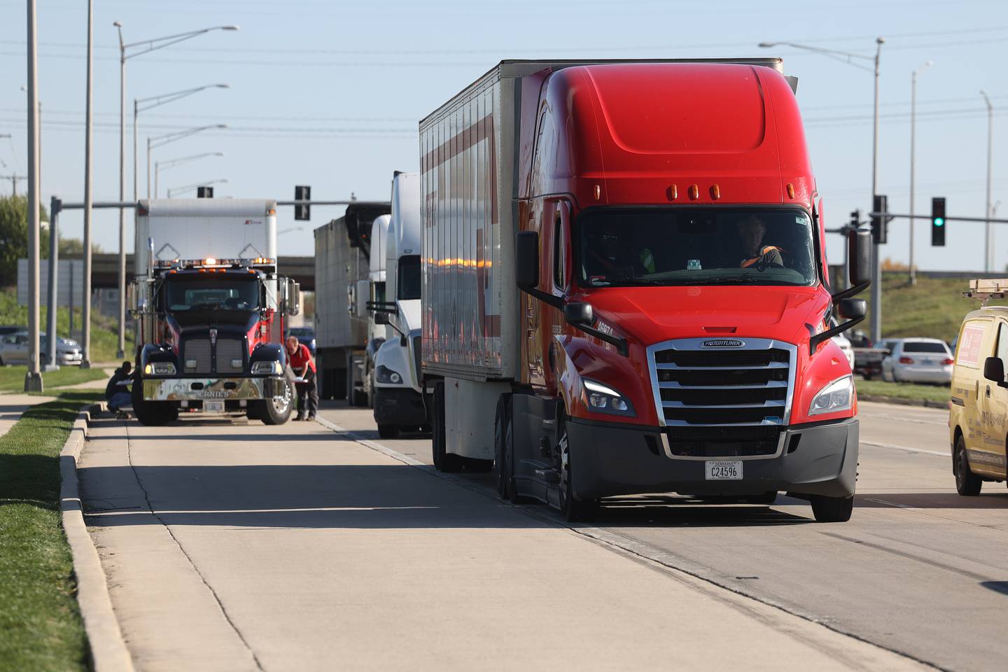 Trucks travel along Route 30 on Tuesday, Oct. 24 in Plainfield.