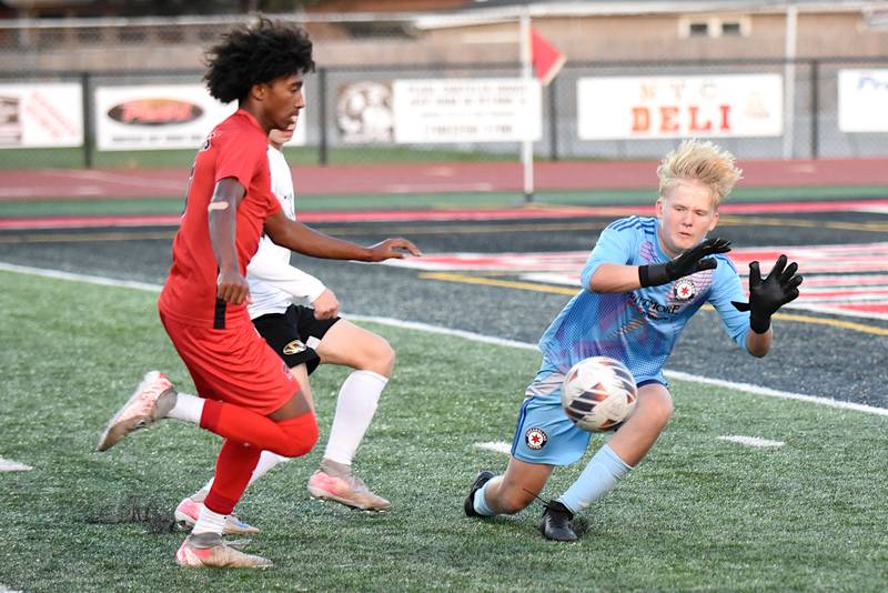 Herscher's Gabriel Kelly, right, makes a diving stop in front of Bradley-Bourbonnais' Josh Jones during a game at Bradley-Bourbonnais Thursday, Sept. 11, 2025.