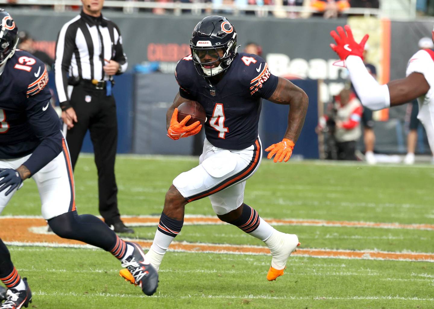Chicago Bears running back D'Andre Swift gets outside of the New England Patriots defense during their game Sunday, Nov. 10, 2024, at Soldier Field in Chicago.