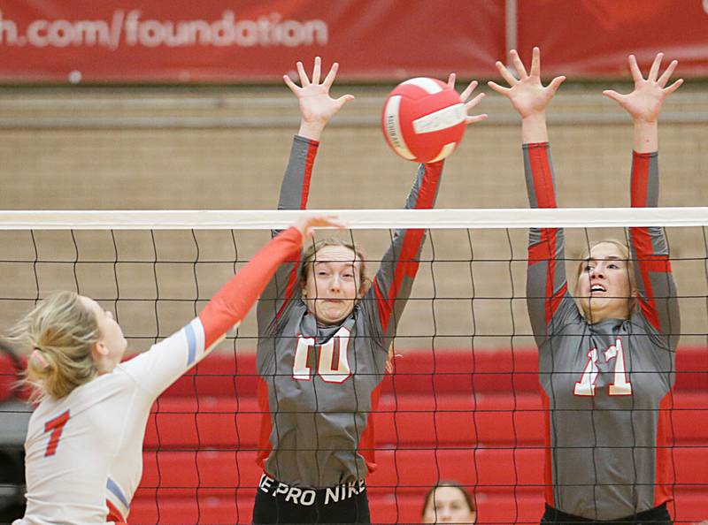 L-P's Kaite Sowers (10) and teammate Olivia Shetterly (17) block a kill from Ottawa's Ryleigh Stevenson (7)  on Tuesday, Oct. 18, 2022 at Kingman Gymnasium in Ottawa.