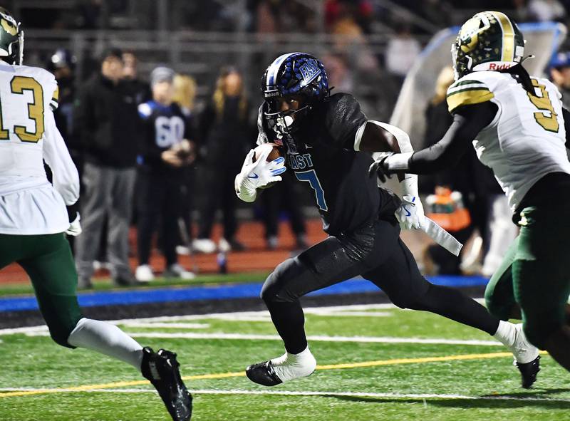 Lincoln-Way East's Zion Gist (7) races to the end zone during the IHSA Class 8A Quarterfinals game against Stevenson on Friday, Nov. 15, 2024, at Frankfort. (Dean Reid for Shaw Local News)