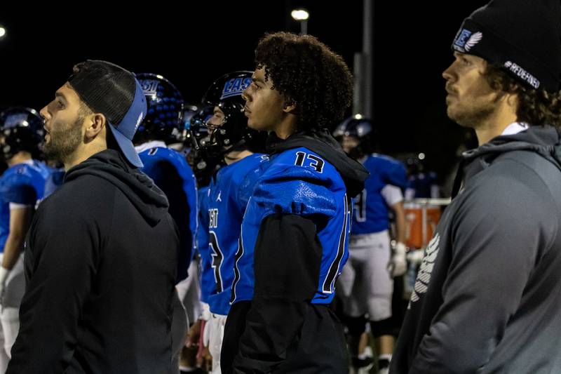 Lincoln-Way East's Jonas Williams watches the action from the sidelines during a varsity football game against Sandburg at Lincoln-Way East on Oct. 23, 2025.