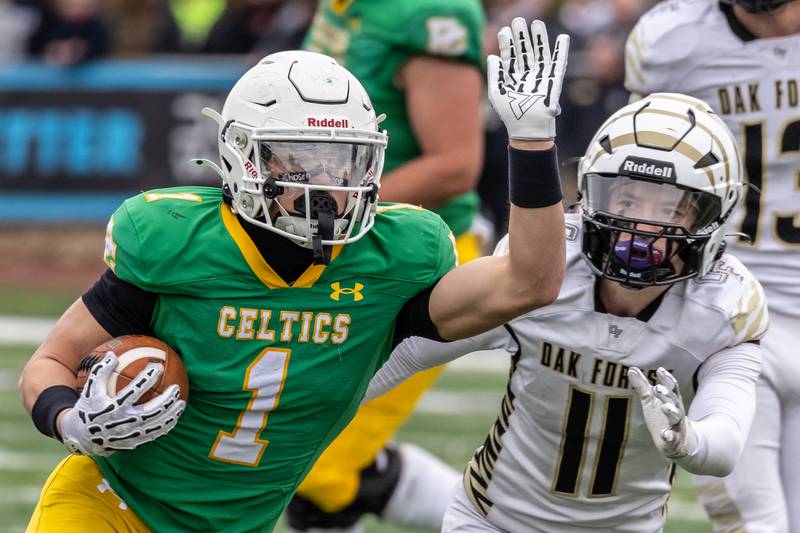 Providence's Bryaden McKay makes a nice move during a 5A varsity football semifinal game against Oak Forest at Providence Catholic High School on Nov. 22, 2025.