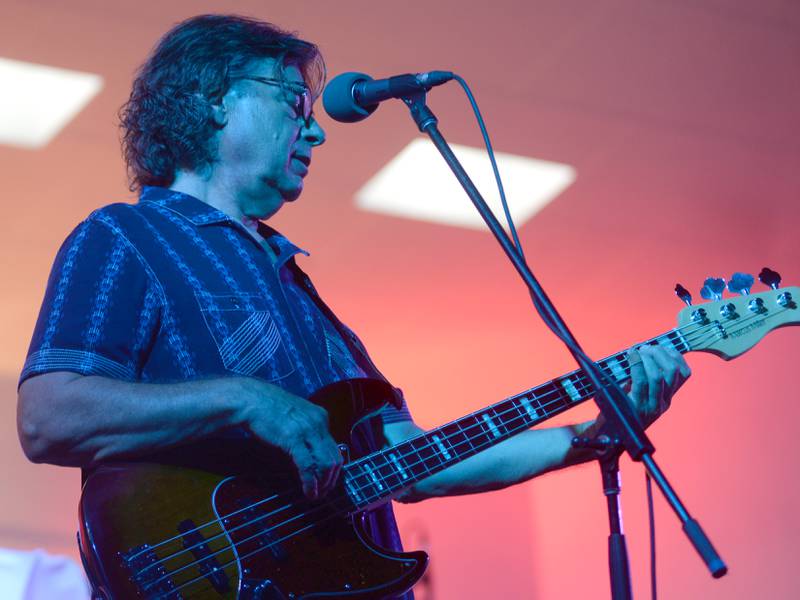 One of the members of Heartache Tonight, an Eagles tribute band, plays his bass guitar at the Jamboree Concert Series in Mt. Morris on Friday, Aug. 22, 2025.