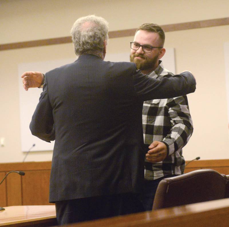 Cody Neuschwanger embraces his attorney Michael Johnson on Thursday, May 11, 2023 after being found not guilty of first degree murder following a 2-day bench trial at the Ogle County Judicial Center in Oregon.