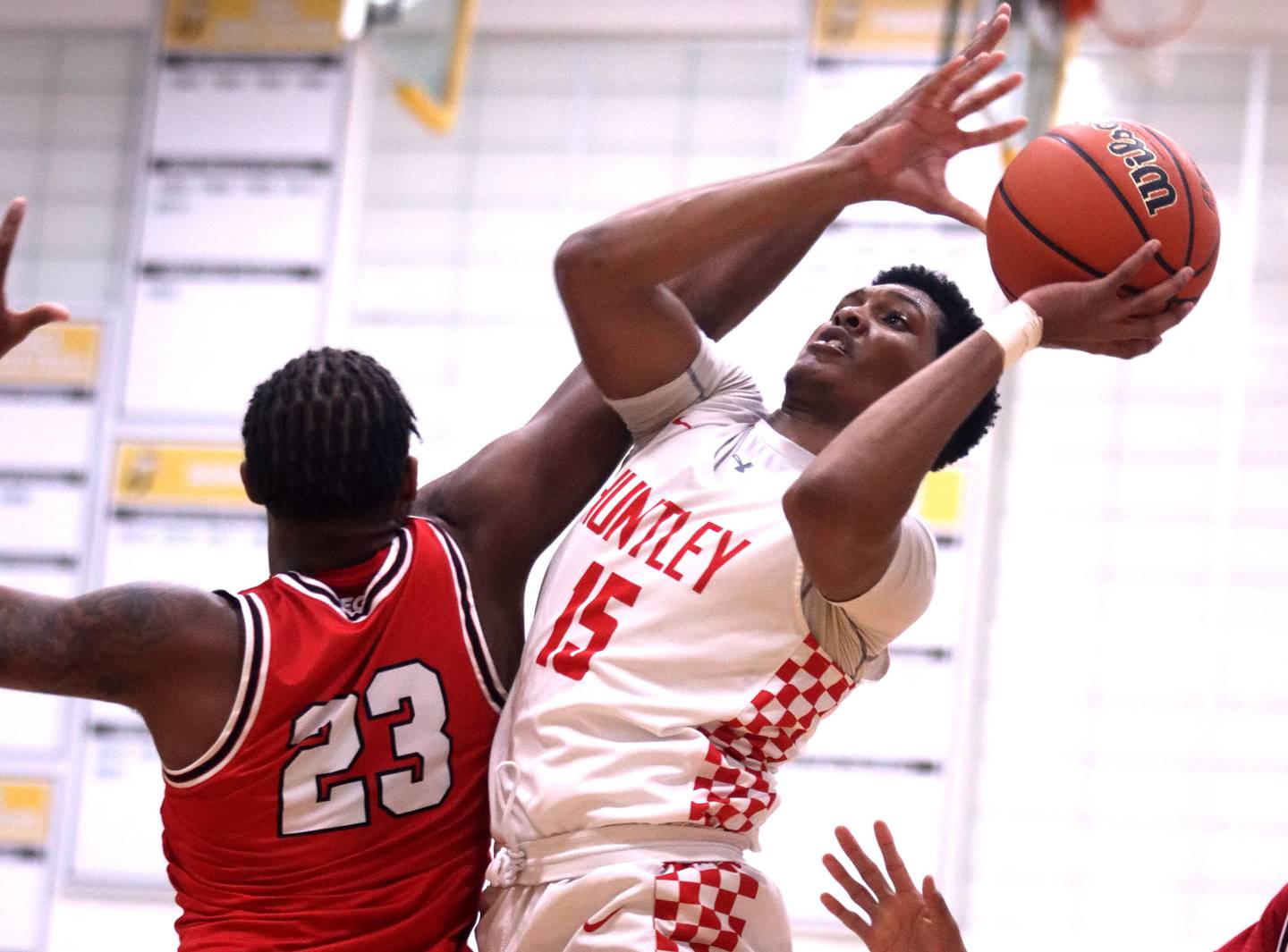 Huntley’s Noah Only, right, shoots past Rockford East’s Latrell Kyles during IHSA Class 4A Regional Championship game action Friday night at Jacobs High School in Algonquin.