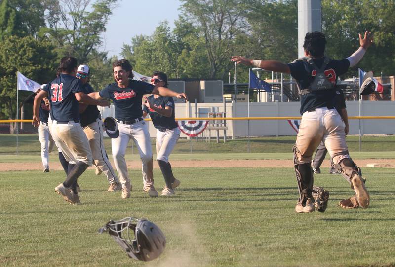 Members of the Burbank baseball team celebrate after defeating Michigan Taylor North during the Central Regional Senior League championship game on Wednesday, July 26, 2023 at Washington Park in Peru.