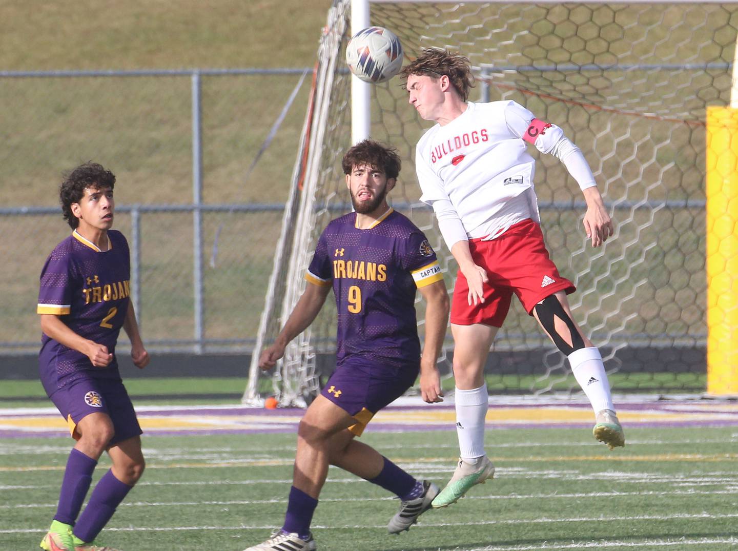 Streator's Noah Russow puts a header on the ball over Mendota's David Casas and teammate Angel Orozco in match this past fall at Mendota High School.