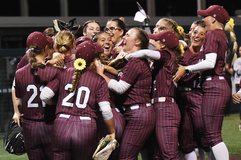 The Lockport softball team celebrates after defeating Bradley-Bourbonnais 2-0 in the Class 4A Illinois Wesleyan Supersectional Monday, June 9, 2025.