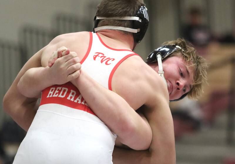 Crystal Lake Central’s Tommy McNeil controls Huntley’s Wyatt Theobald at 215 pounds in varsity wrestling on Friday, Dec. 13, 2024 at Huntley High School in Huntley.
