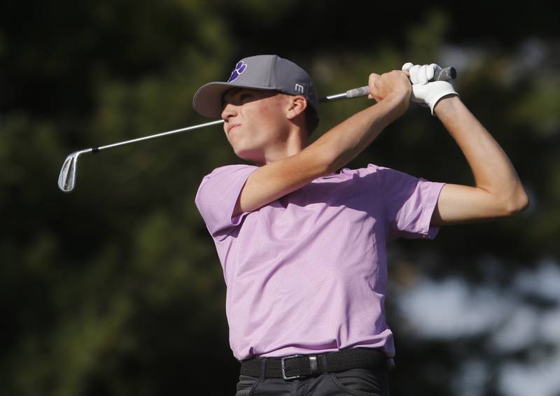 Hampshire’s Seth Gillie watches his tee shot on the eighth hole during the IHSA Class 3A Jacobs Sectional golf tournament on Monday, Oct. 7, 2024, at Randall Oaks Golf Club in West Dundee.