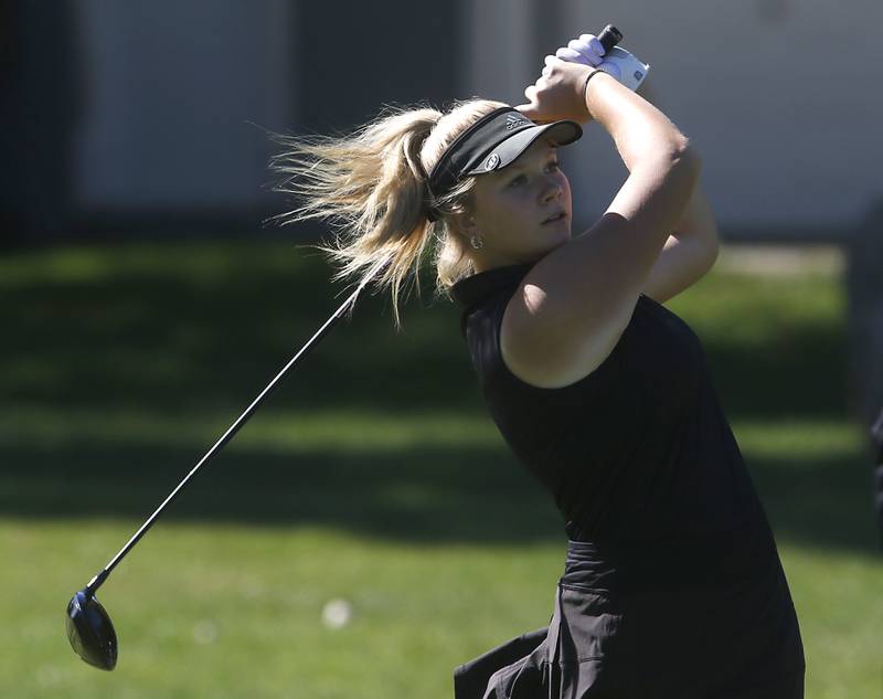 Huntley’s Maddie Sloan watches her tee shot on the second hole during the IHSA Class 2A Huntley Girls Golf Regional on Tuesday, Oct. 1, 2024, at Pinecrest Golf Club in Huntley.